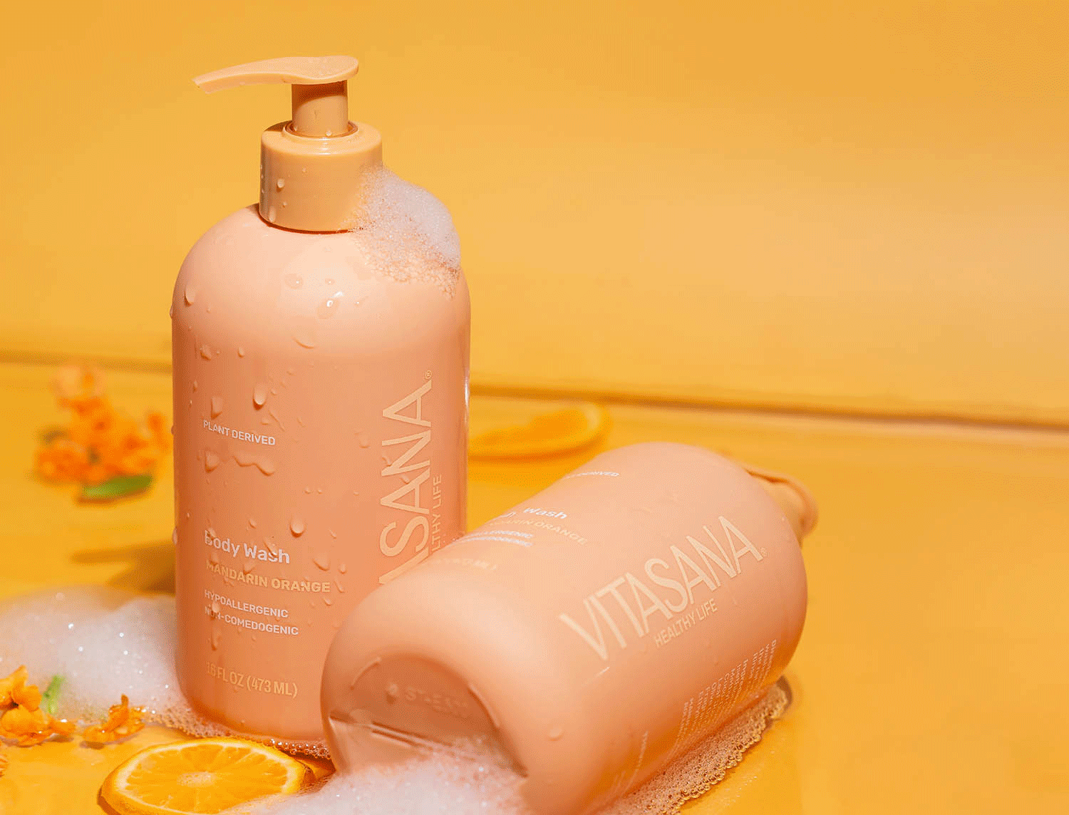 Hero animation: product photos of two Vitasana body washes (Mandarin Orange and Sea Buckthorn Bergamot scents), with labels created by Gold Spark Design.